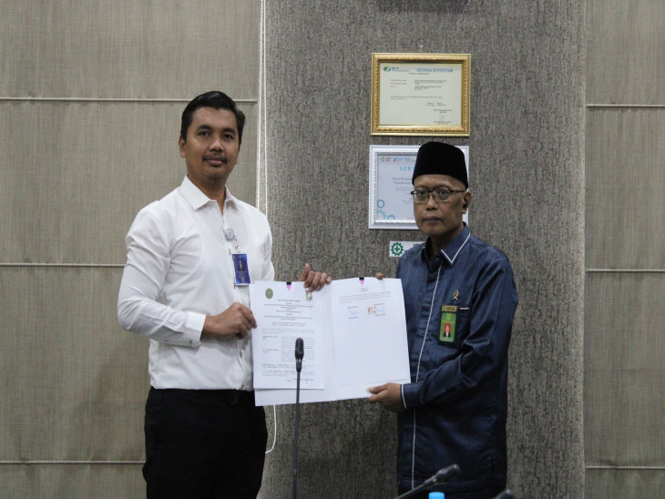 Penandatangan Perjanjian Kerja Sama antara DPMPTSP Kabupaten Kampar dengan Pengadilan Agama Bangkinang tentang Penyelenggaraan PelayananMPP Kabupaten Kampar